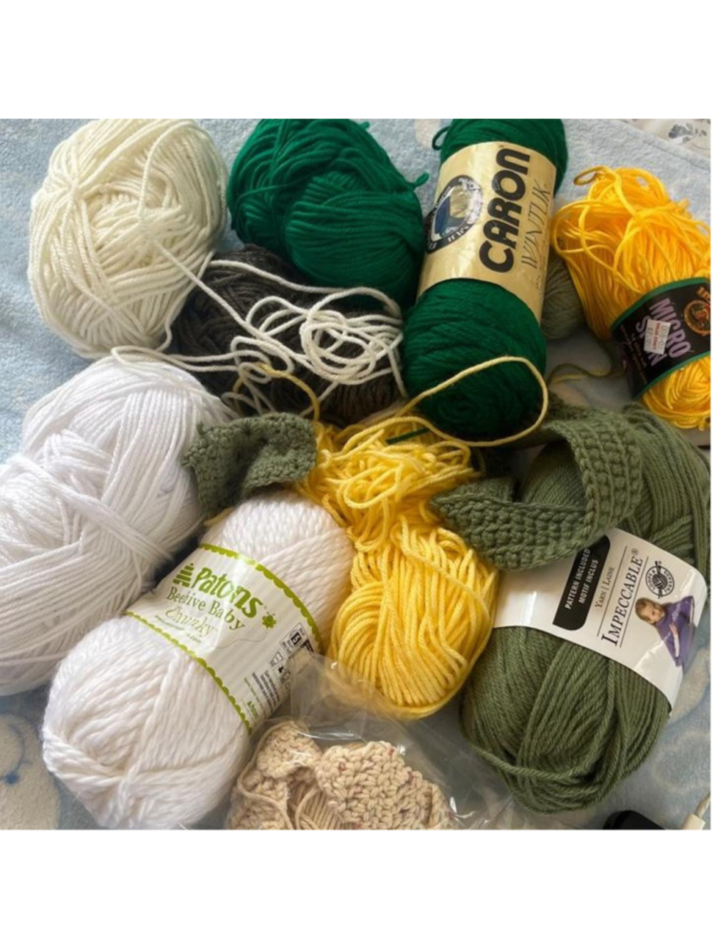 Multi-colored yarn bundle with Patons, Caron, and Bernat brands #knitting #croch